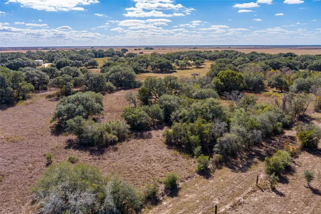 a view of a city with mountains in the background
