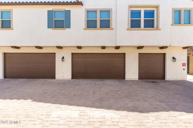a view of outdoor space with porch and potted plants