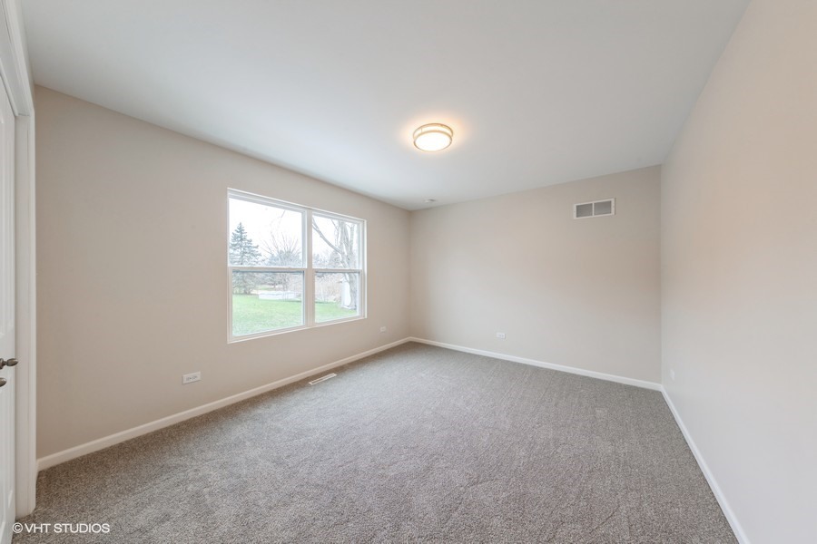 24358 Liberty Street Crete, IL 60417 - Photo 12 of 16 an empty room with a window