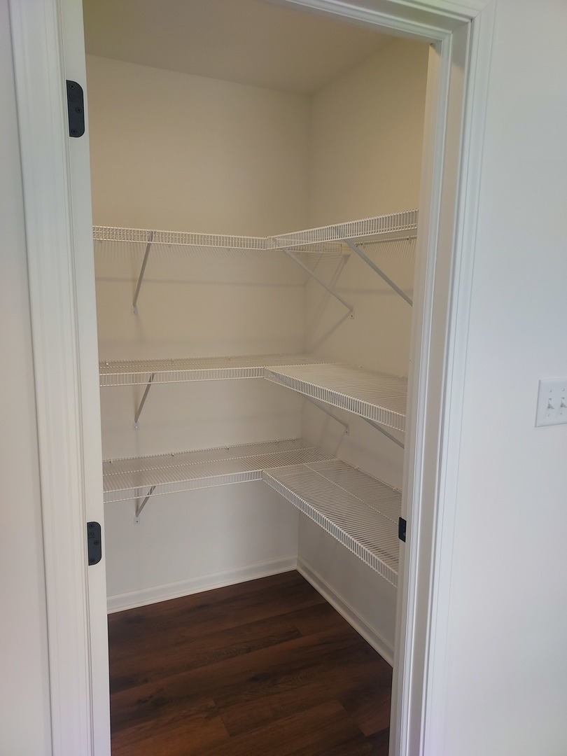 24358 Liberty Street Crete, IL 60417 - Photo 4 of 13 a view of an empty walk in closet
