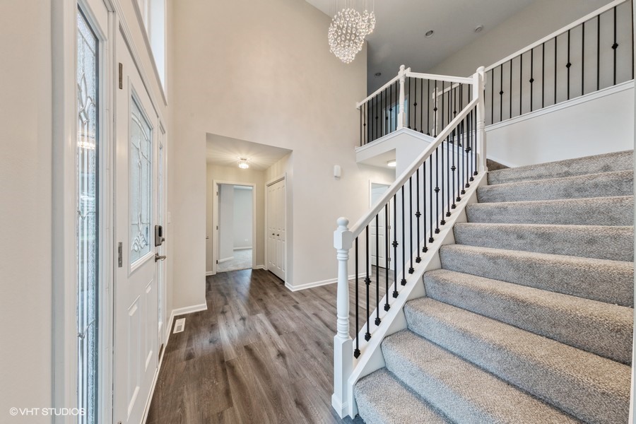 24358 Liberty Street Crete, IL 60417 - Photo 6 of 16 a view of an entryway with wooden floor