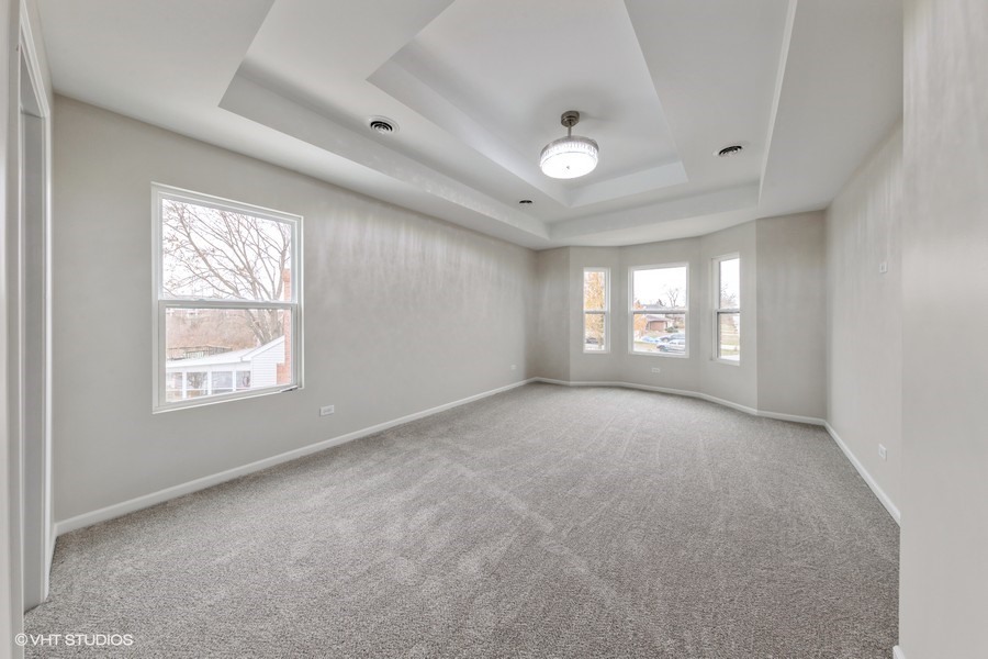 24358 Liberty Street Crete, IL 60417 - Photo 9 of 16 a view of an empty room with a window