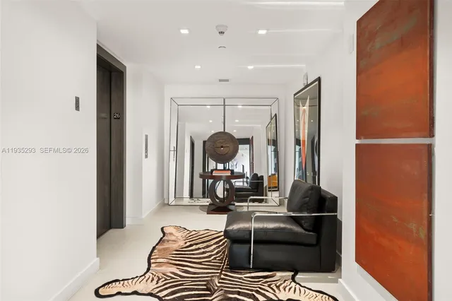 a view of empty room with glass door