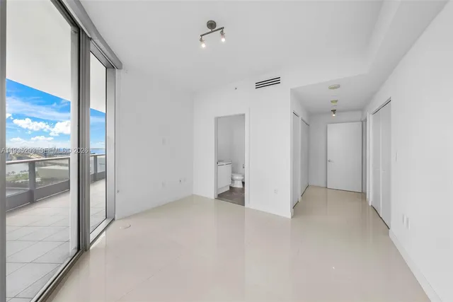 a view of swimming pool from a balcony