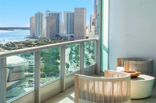 a bathroom with a sink mirror and vanity