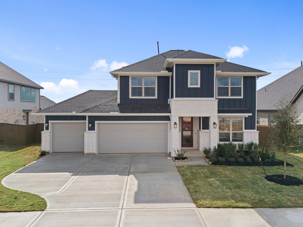 644 Cross Timbers Trace Waller, TX 77484 - Photo 29 of 33 a front view of a house with a yard