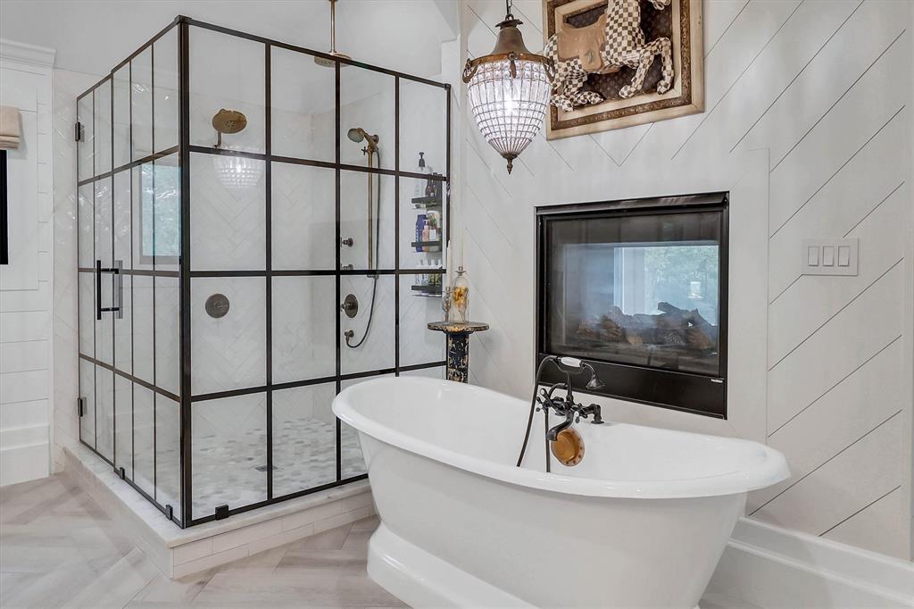 1901 Spring Mountain Road Cross Roads, TX 76227 - Photo 31 of 40 Freestanding soaking tub with a wall-mounted fireplace