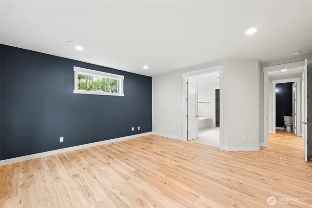 a view of a livingroom with wooden floor