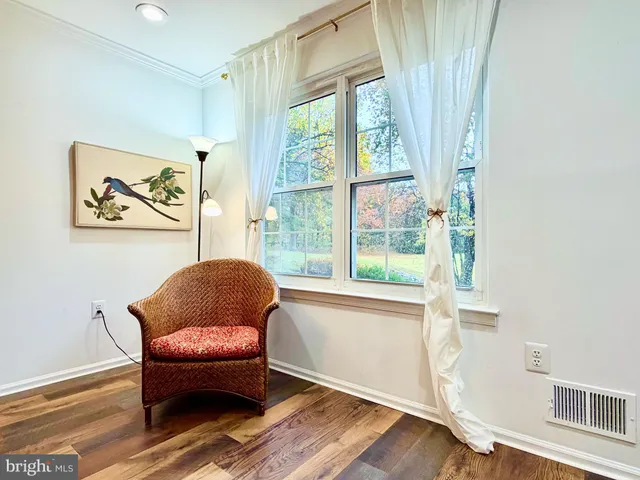 a room with furniture and a window