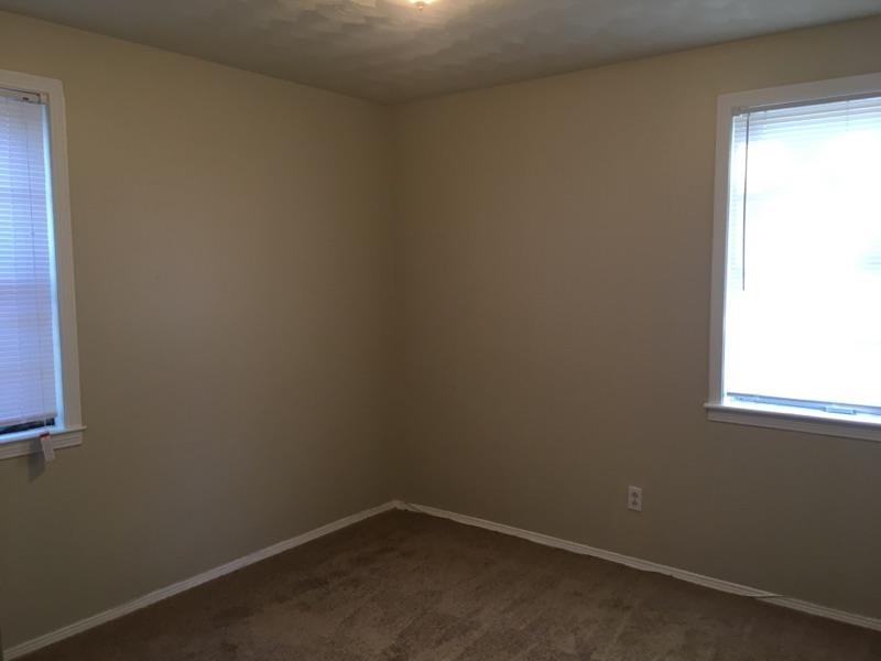 3092 Knightway Road Memphis, TN 38118 - Photo 11 of 12 Spare room featuring dark carpet