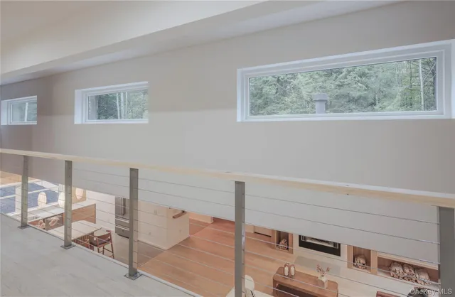 a view of workspace with furniture and window