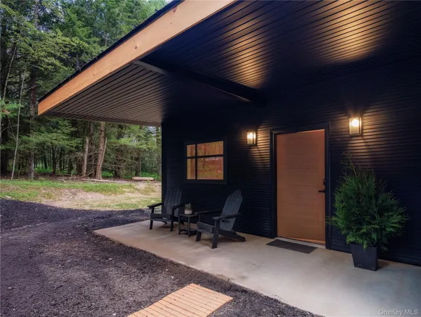 a view of backyard with hardwood and deck