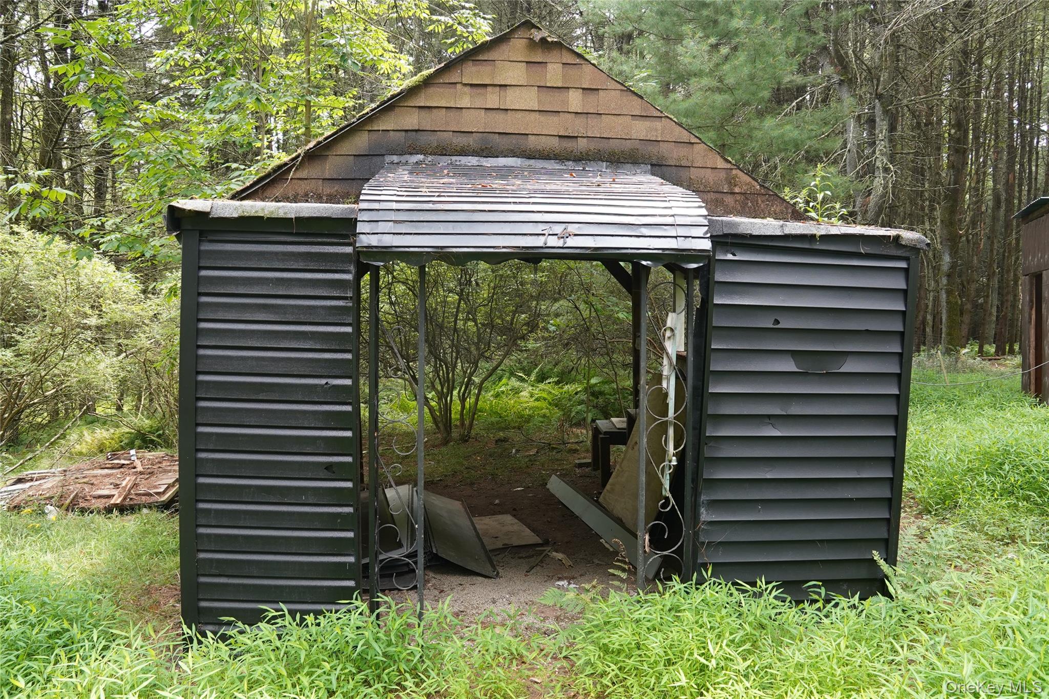 233 Goldsmith Road Jeffersonville, NY 12748 - Photo 27 of 30 a view of a house with a balcony