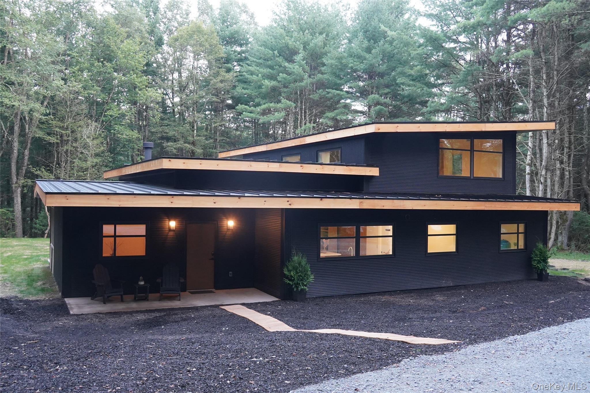 233 Goldsmith Road Jeffersonville, NY 12748 - Photo 3 of 30 a view of a house with a yard