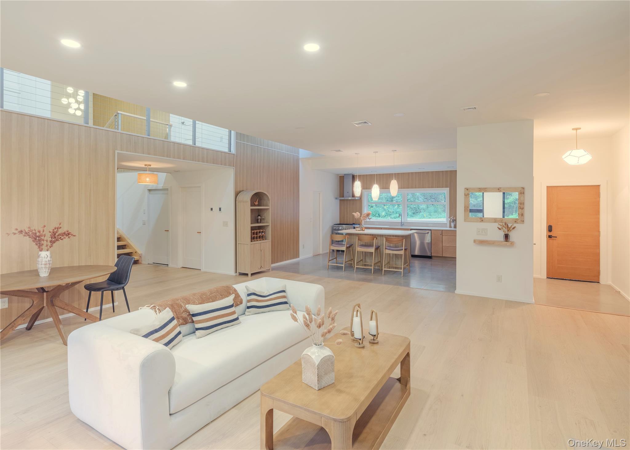 233 Goldsmith Road Jeffersonville, NY 12748 - Photo 8 of 30 a living room with furniture and a large window