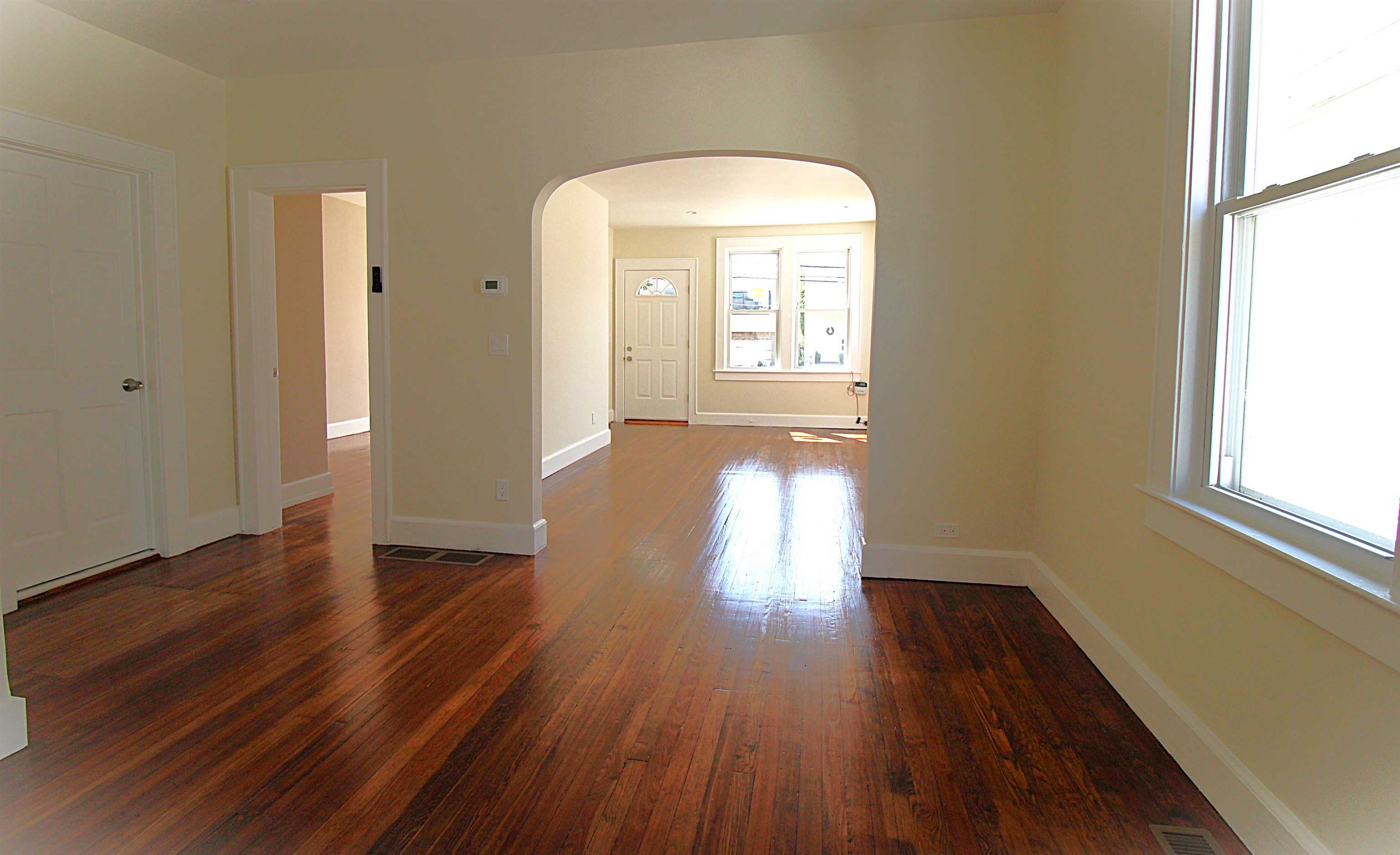 244 Centre Avenue, Unit 1 Secaucus, NJ 07094 - Photo 7 of 23 a view of empty room with wooden floor and fan