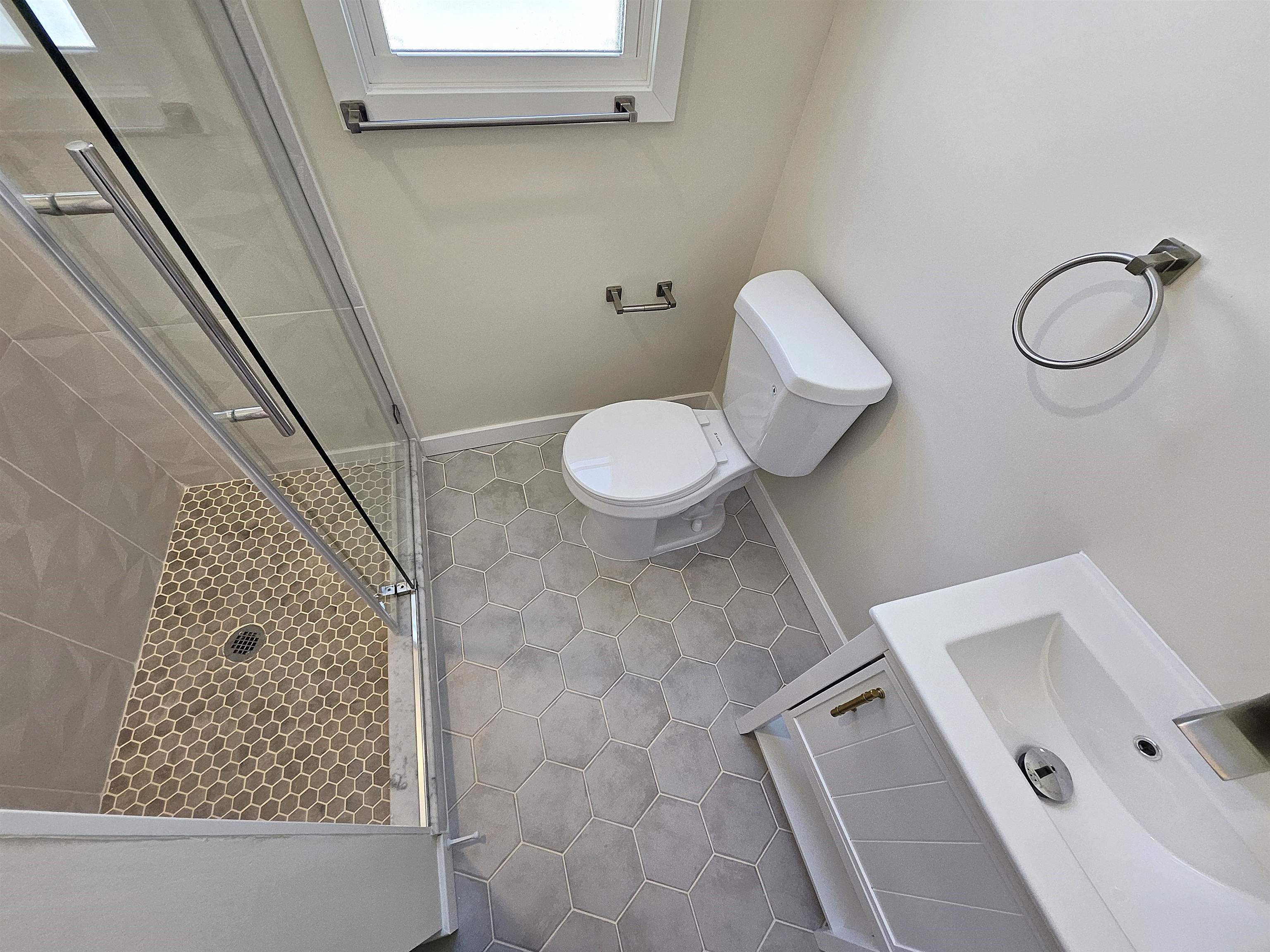 244 Centre Avenue, Unit 1 Secaucus, NJ 07094 - Photo 8 of 23 a bathroom with a toilet and a shower