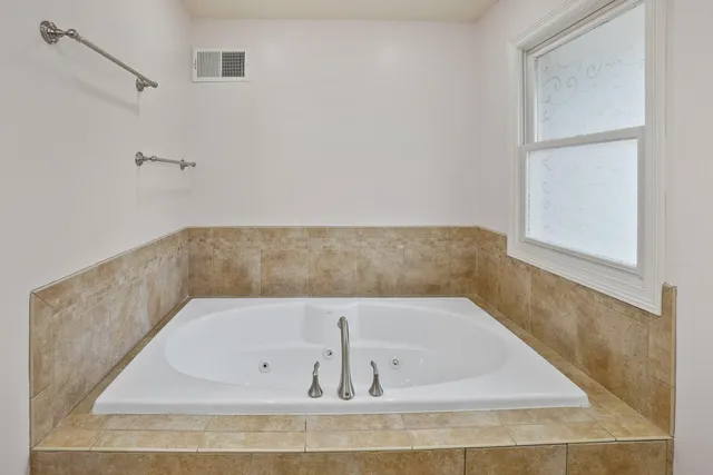 a bathroom with a bathtub