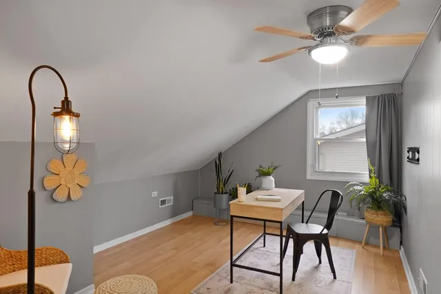 a workspace with furniture and window