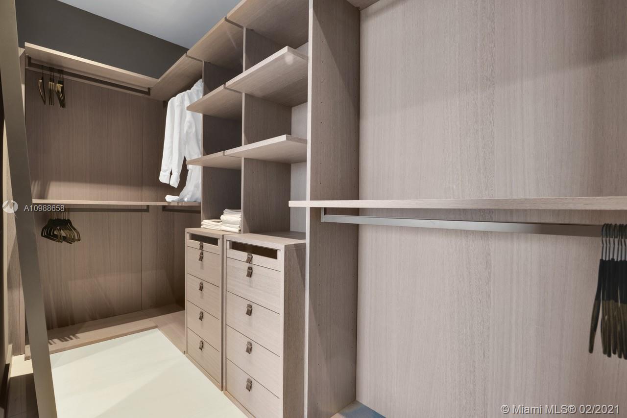 480 Northeast 31st Street, Unit PH5402 Miami, FL 33137 - Photo 18 of 35 a view of walk in closet