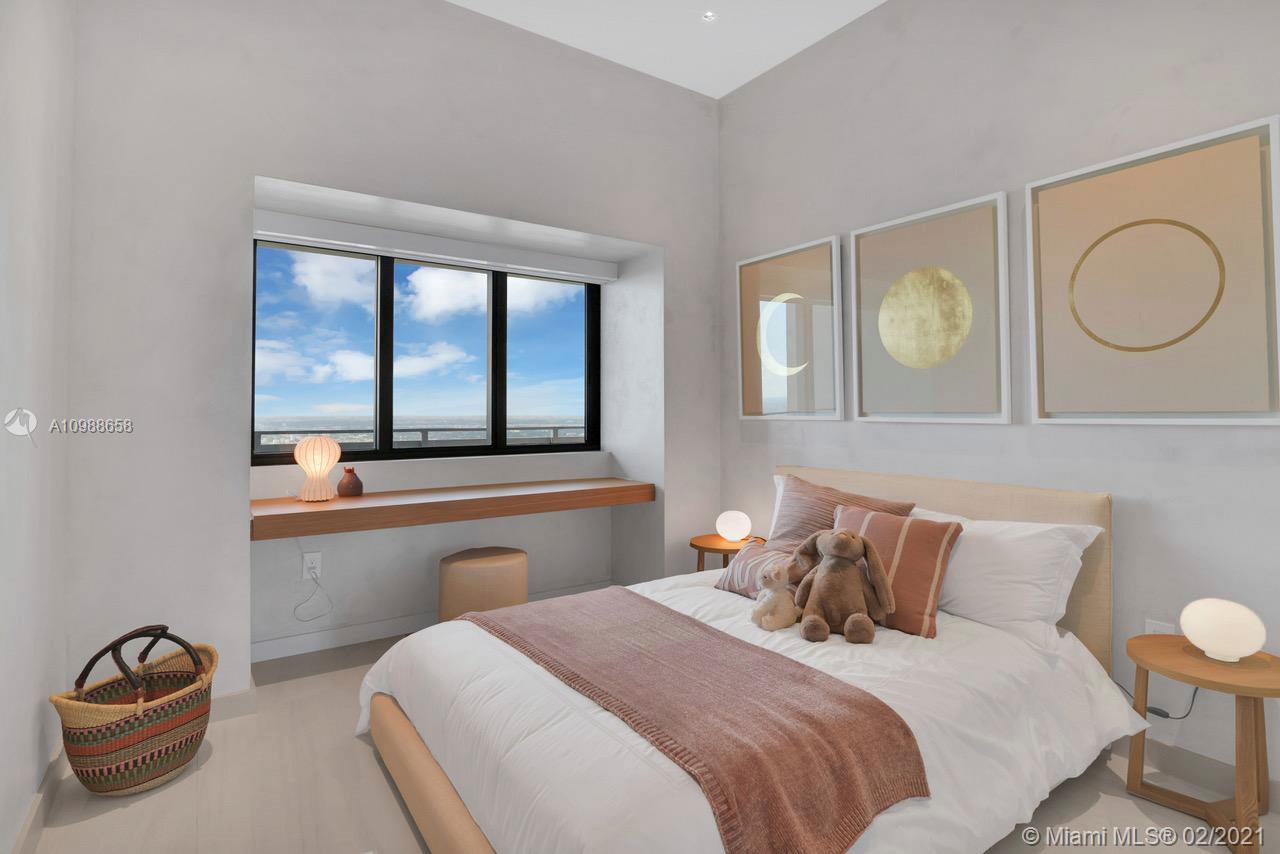 480 Northeast 31st Street, Unit PH5402 Miami, FL 33137 - Photo 20 of 35 a bedroom with a bed and window