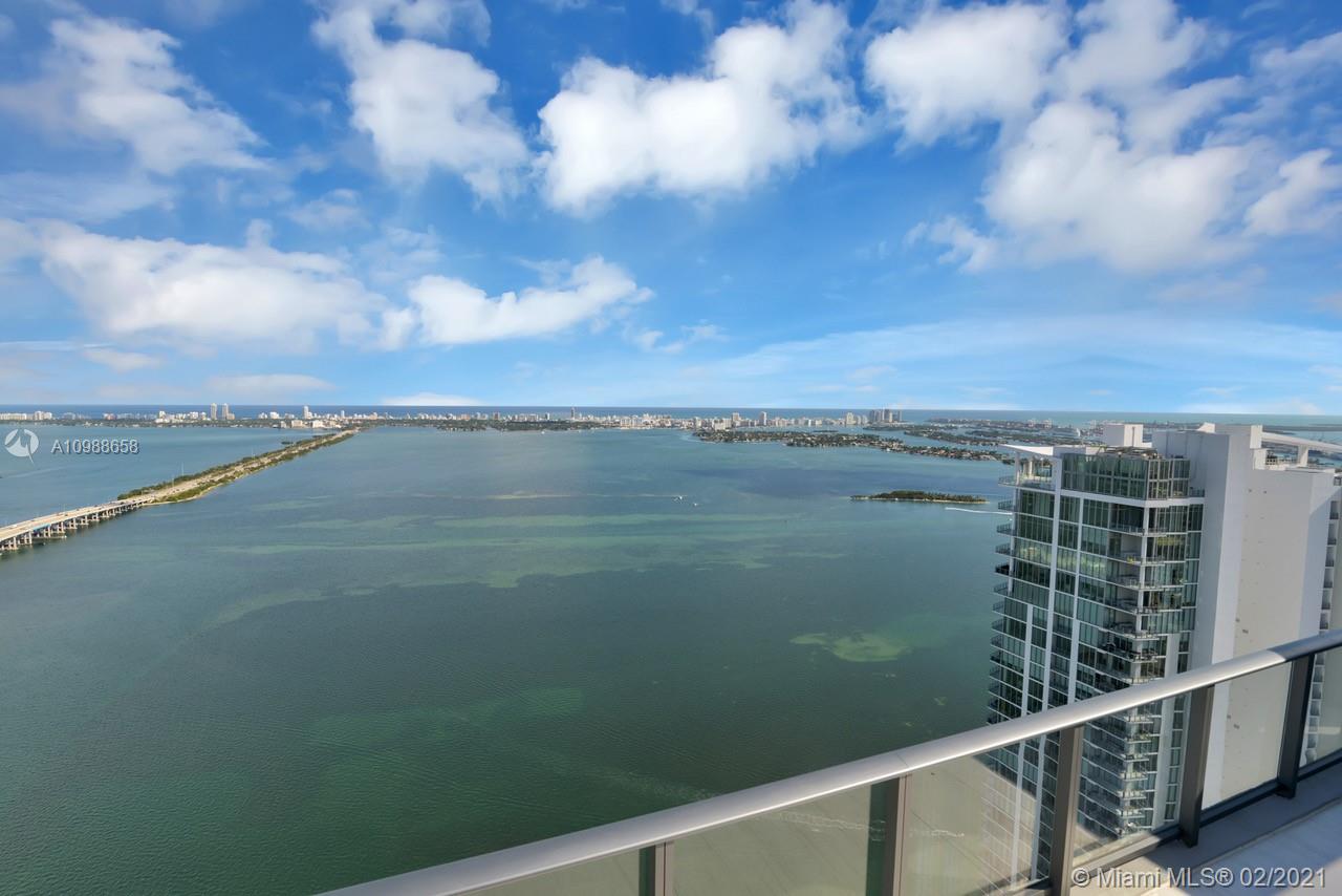 480 Northeast 31st Street, Unit PH5402 Miami, FL 33137 - Photo 33 of 35 a view of a lake from a balcony