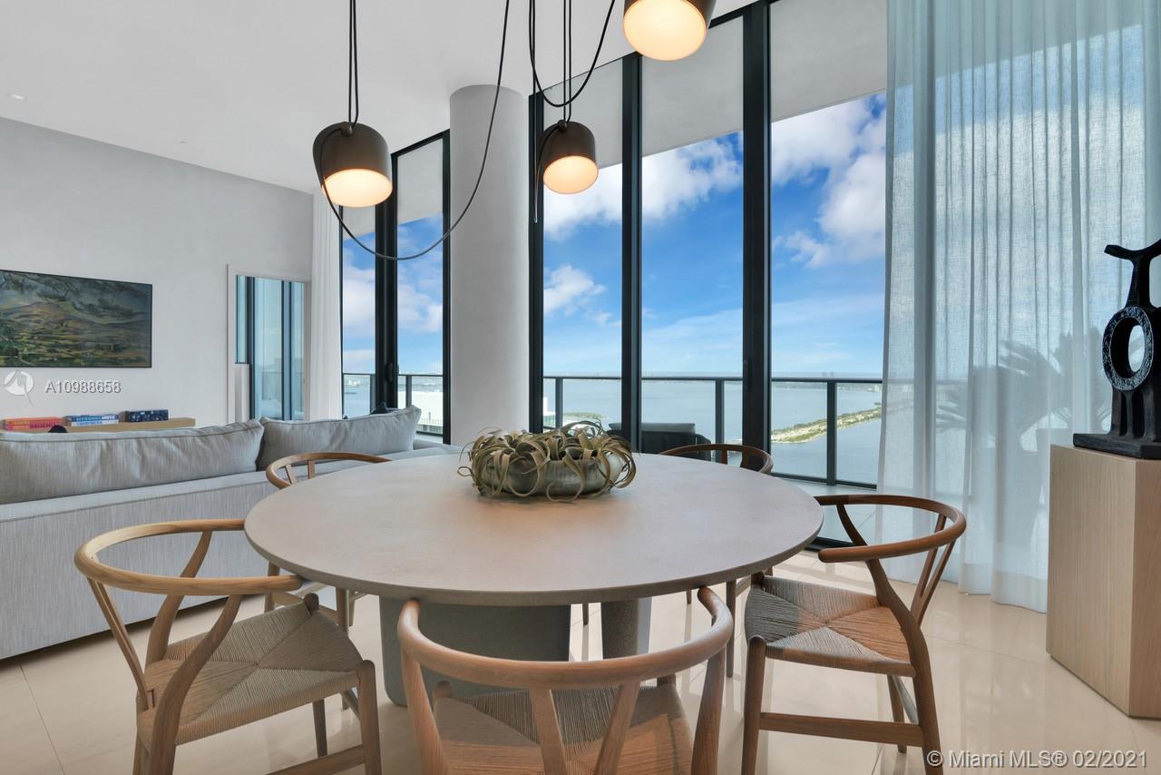 480 Northeast 31st Street, Unit PH5402 Miami, FL 33137 - Photo 5 of 35 a view of a dining room with furniture and window