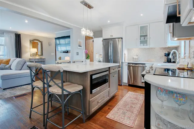 a front view of house with outdoor seating