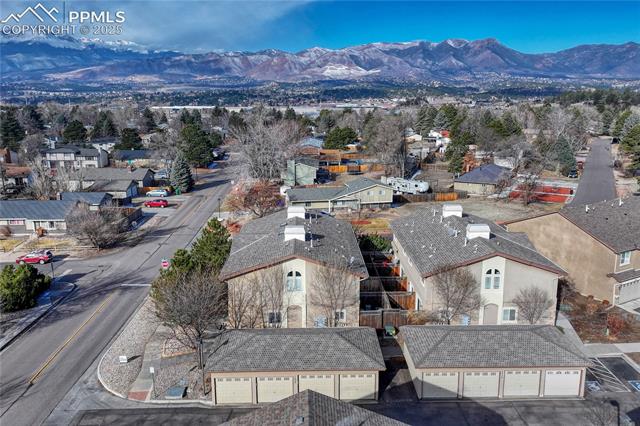 1502 York Road, Unit 102 Colorado Springs, CO 80920 - Photo 27 of 29 Bird's eye view featuring a mountain view and a residential view