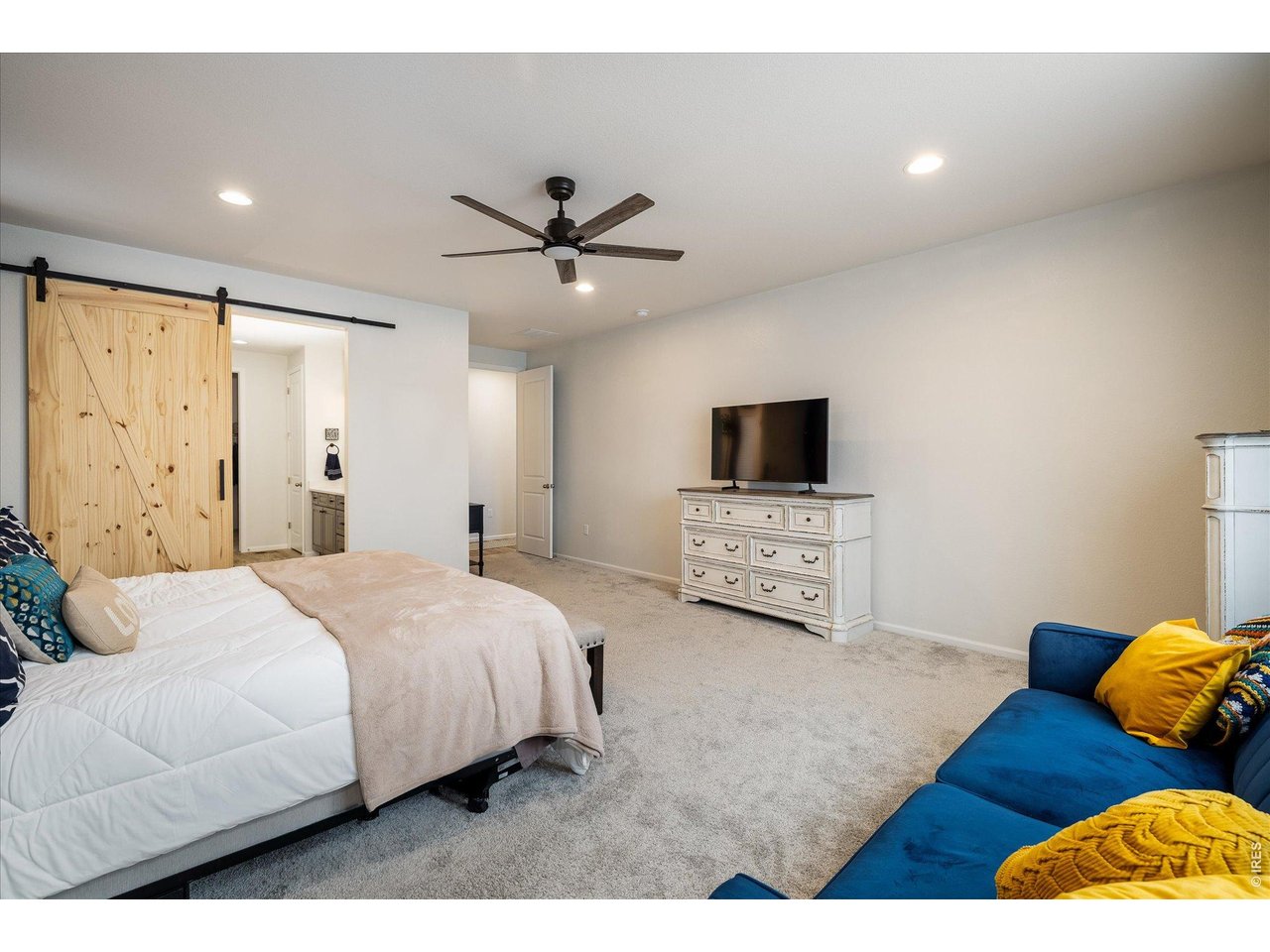 5311 Routt Court Arvada, CO 80002 - Photo 13 of 48 Private primary suite designed for rest and comfort