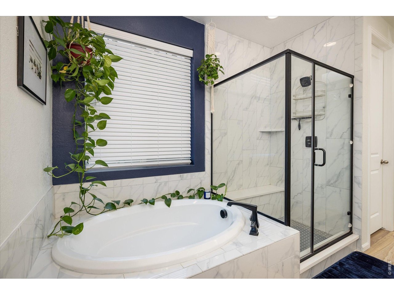 5311 Routt Court Arvada, CO 80002 - Photo 16 of 48 Relaxing soaking tub with separate shower