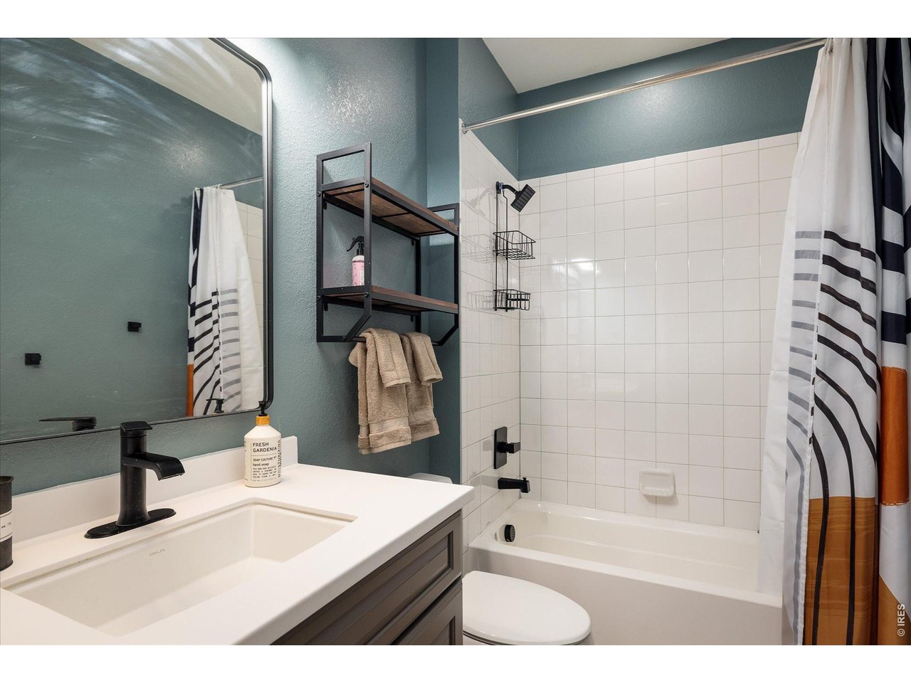 5311 Routt Court Arvada, CO 80002 - Photo 20 of 48 Upgraded secondary full bathroom with modern touches