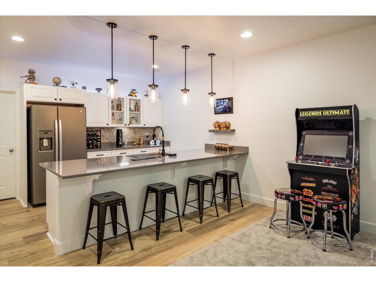 5311 Routt Court Arvada, CO 80002 - Photo 24 of 48 Stylish bar area for hosting friends