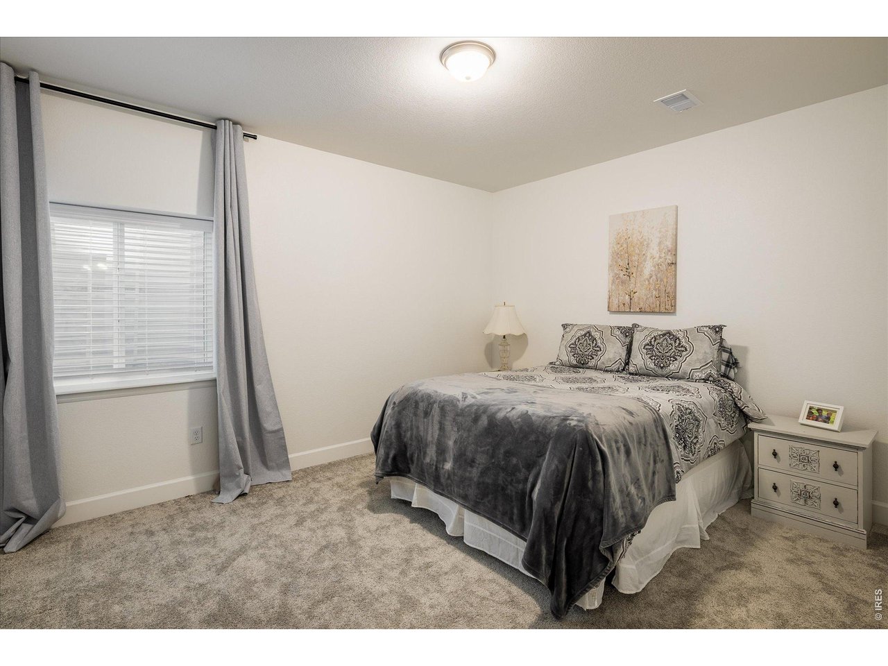 5311 Routt Court Arvada, CO 80002 - Photo 26 of 48 Peaceful bedroom retreat with soft natural light