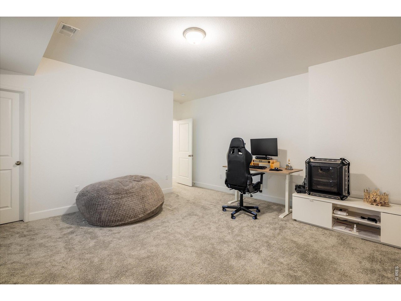 5311 Routt Court Arvada, CO 80002 - Photo 28 of 48 Large 5th bedroom for work or relaxation