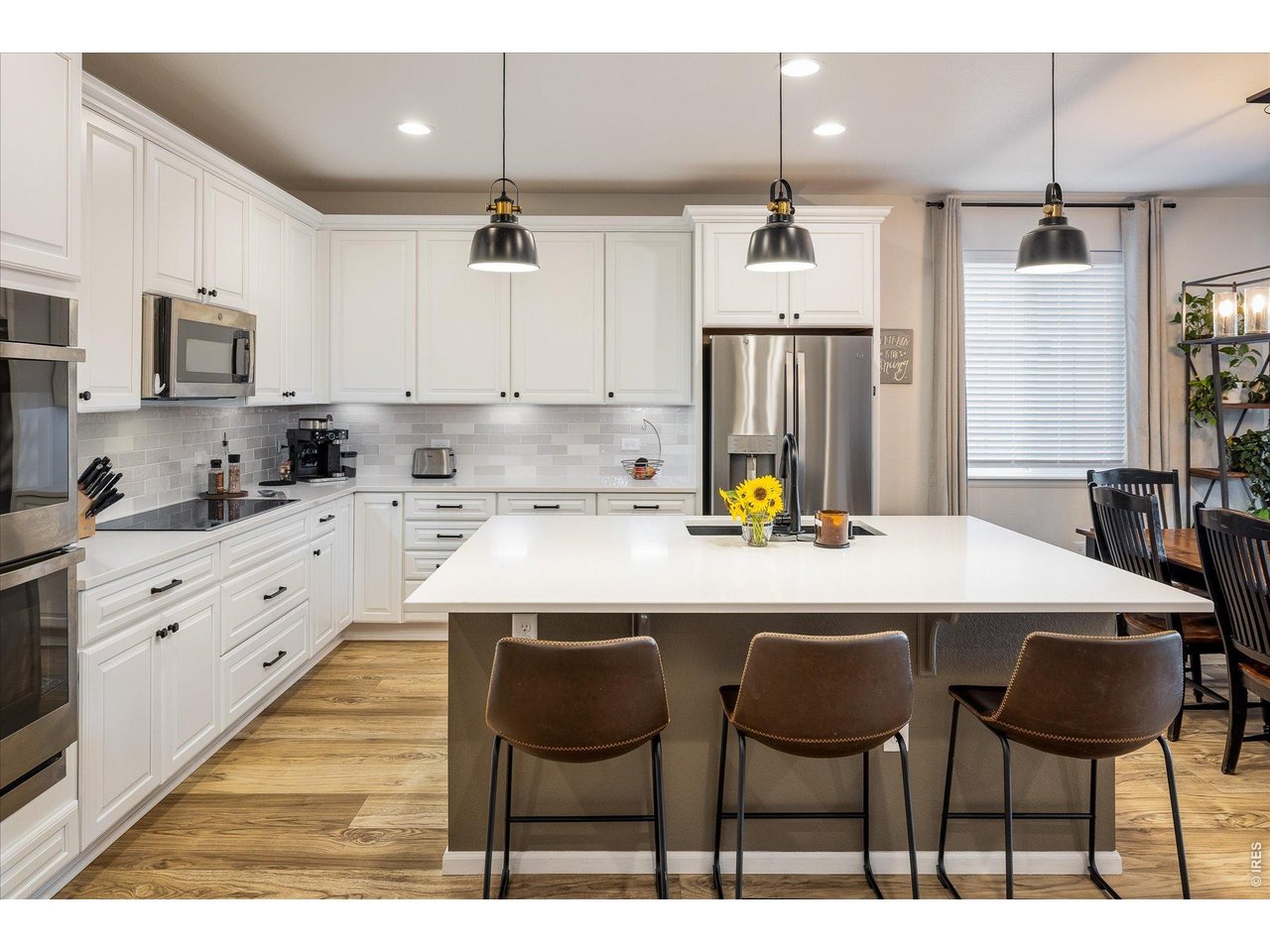 5311 Routt Court Arvada, CO 80002 - Photo 5 of 48 Updated kitchen with spacious layout and style