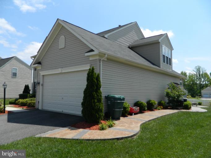 154 Riggs Road Fredericksburg, VA 22405 - Photo 21 of 27 Garage Side with Sidewalk
