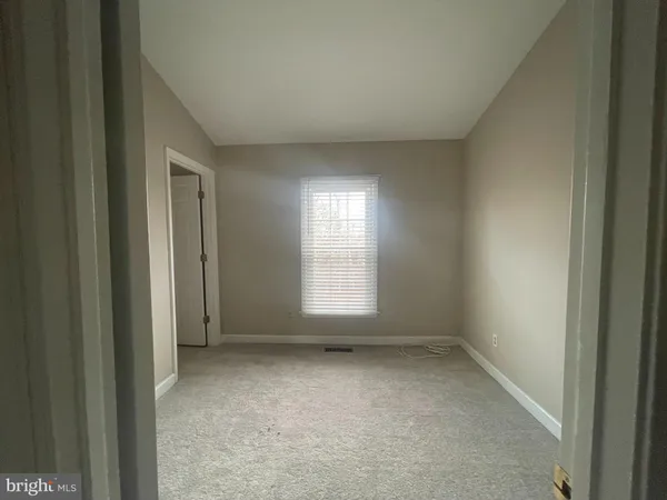 a view of empty room with window