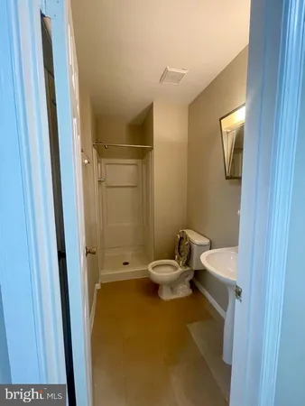 a bathroom with a sink and toilet
