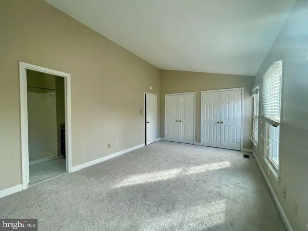 an empty room with a bathroom