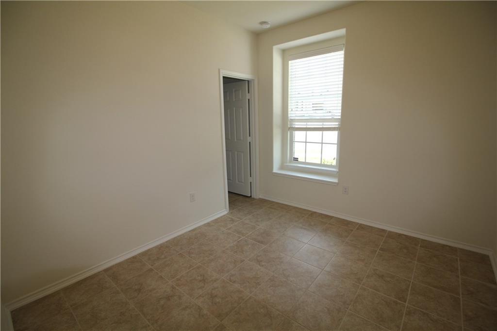 7200 Altidore Drive Austin, TX 78744 - Photo 18 of 23 an empty room with a window