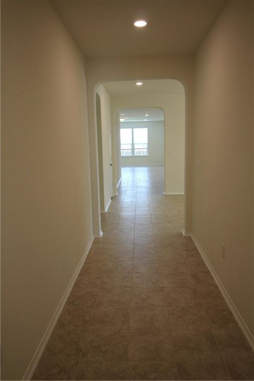 7200 Altidore Drive Austin, TX 78744 - Photo 2 of 23 a view of hallway with window