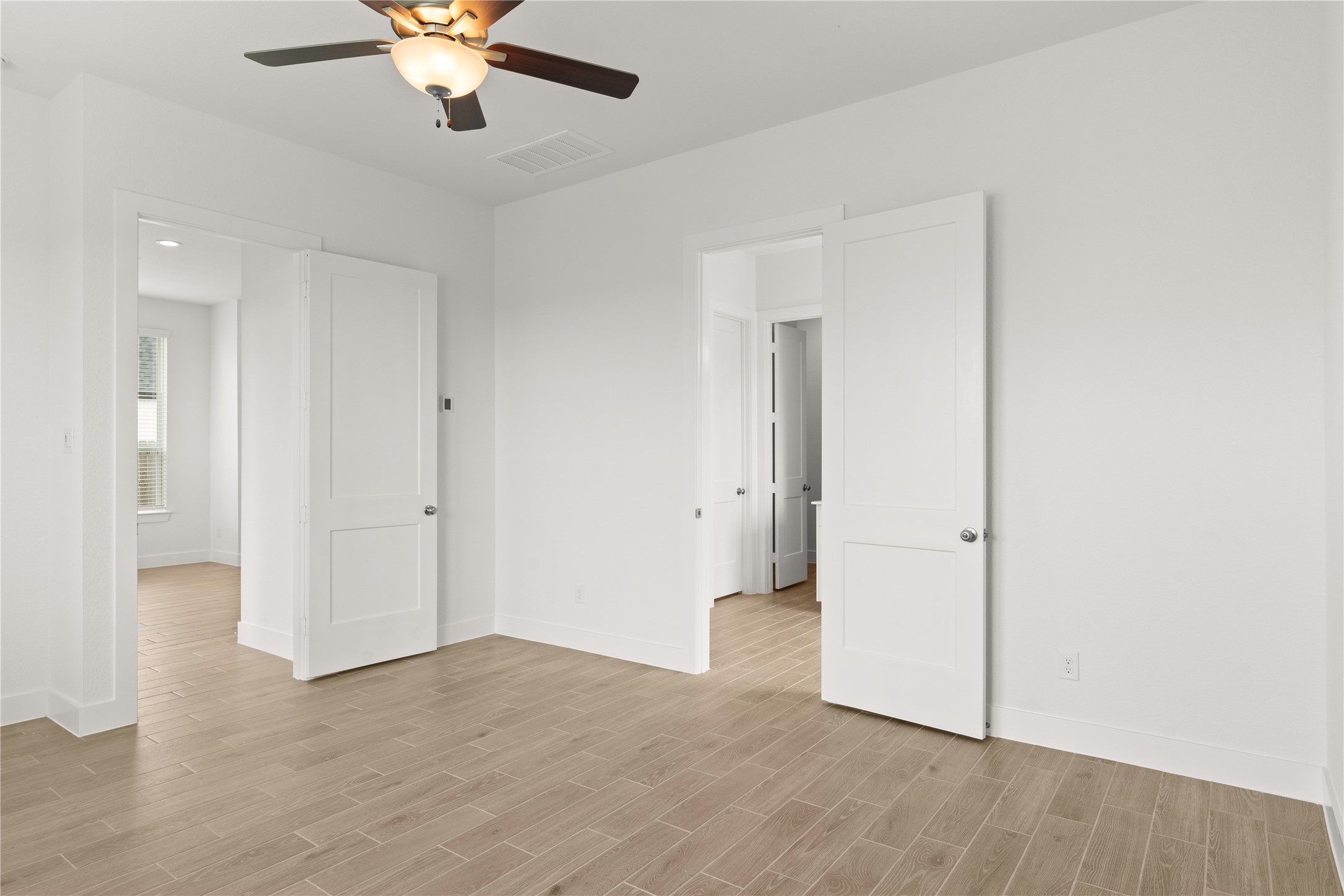 620 Deep Sands Drive Hempstead, TX 77445 - Photo 18 of 35 an empty room with fan and entrance