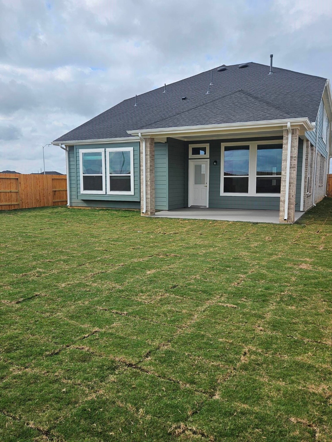 620 Deep Sands Drive Hempstead, TX 77445 - Photo 29 of 35 a front view of a house with a garden