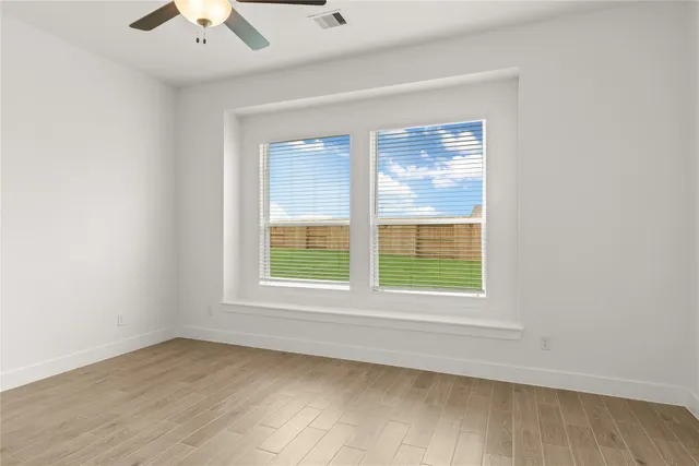 an empty room with a window