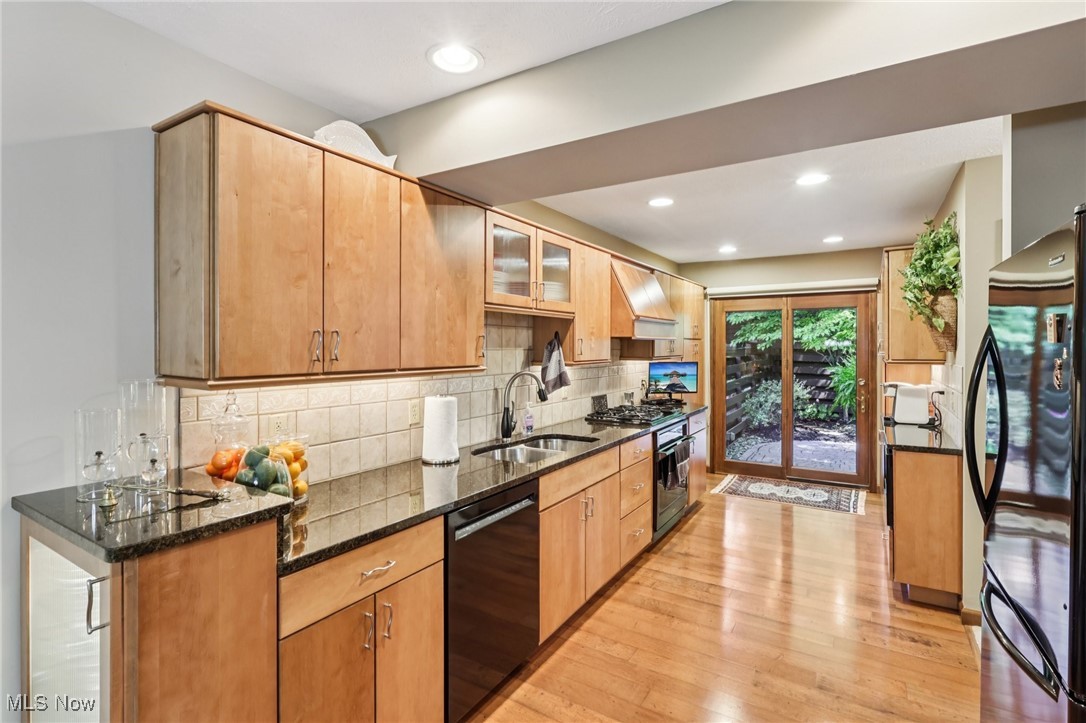 235 Solon Road, Unit D Chagrin Falls, OH 44022 - Photo 10 of 37 Kitchen featuring tasteful backsplash,