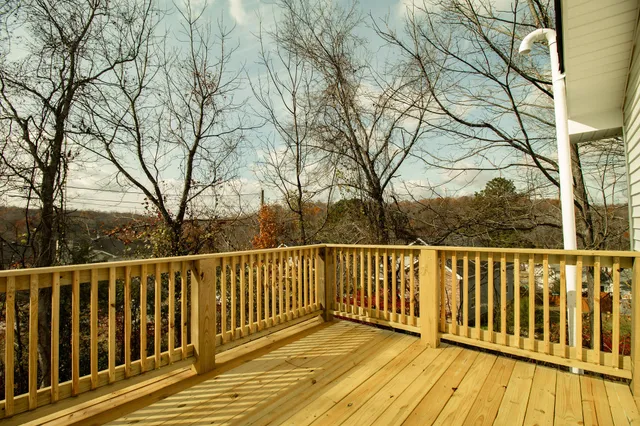 a view of a wooden roof deck