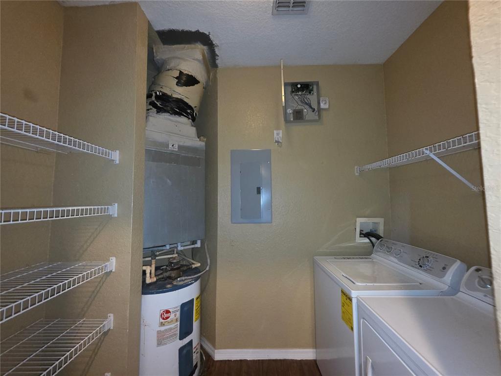 824 Grand Regency Pointe, Unit 101 Altamonte Springs, FL 32714 - Photo 14 of 14 a bathroom with a sink toilet and vanity