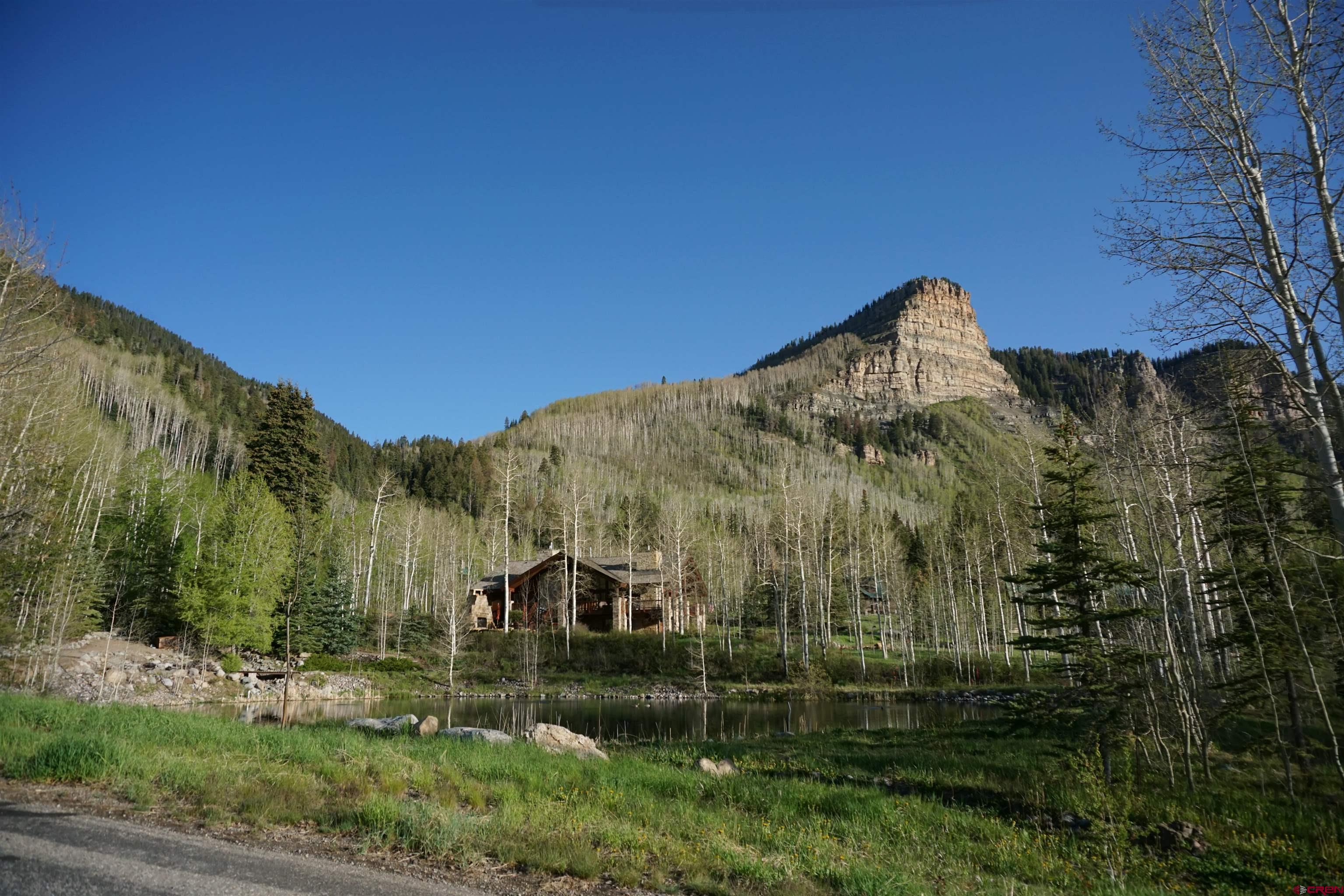 350 Falcon Ridge Road Durango, CO 81301 - Photo 16 of 39 a view of a house with a yard