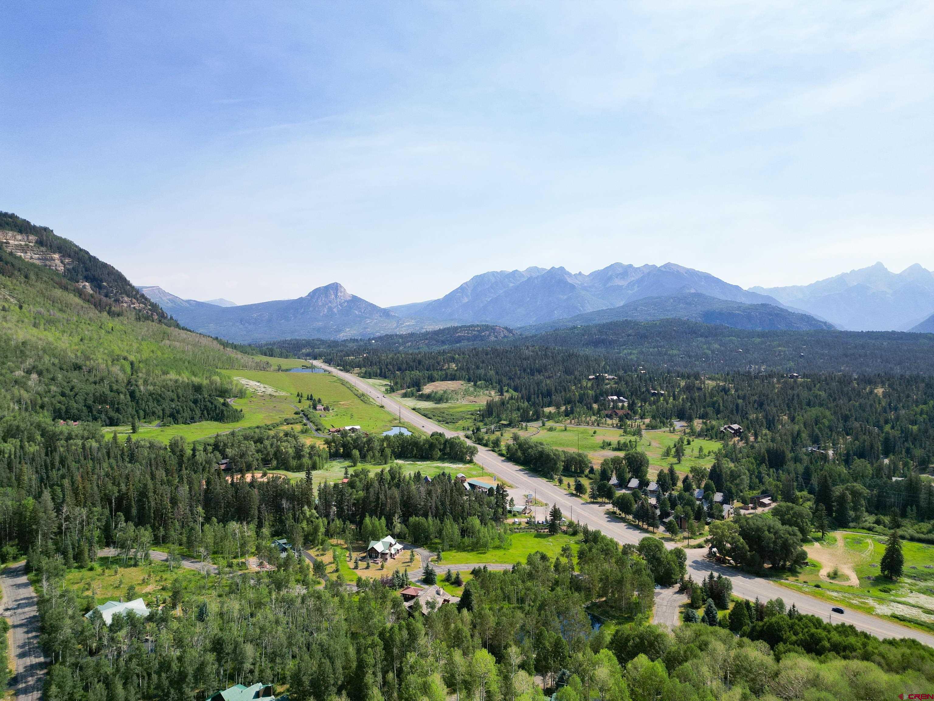 350 Falcon Ridge Road Durango, CO 81301 - Photo 3 of 39 a view of a lush green hillside and houses